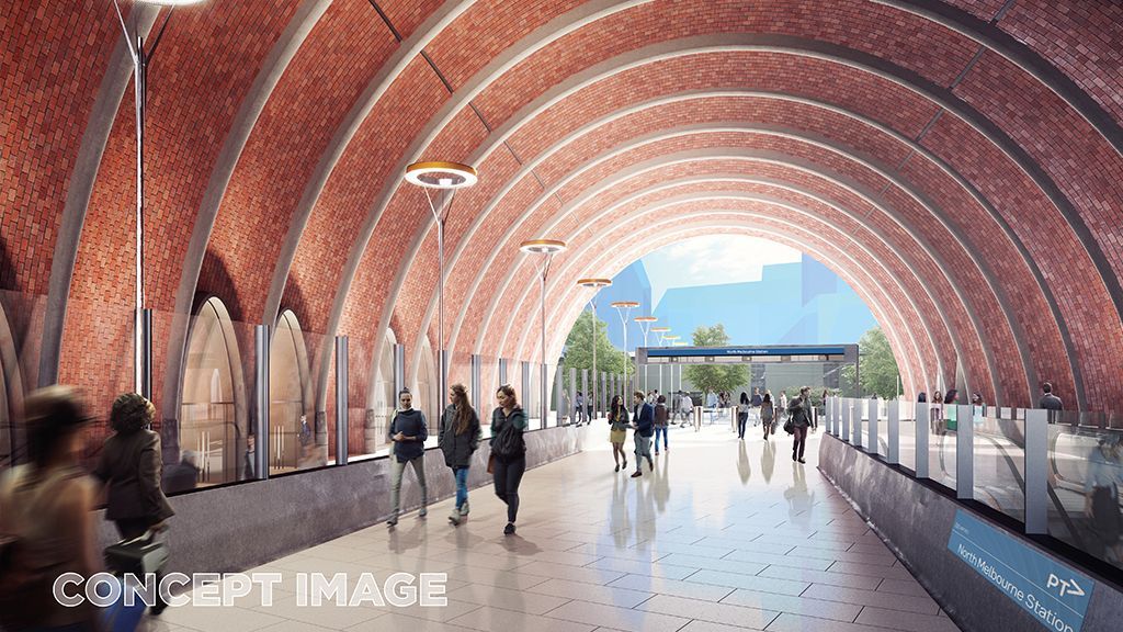 The entrance to North Melbourne Station features large-scale red brick, referencing the suburb’s industrial heritage