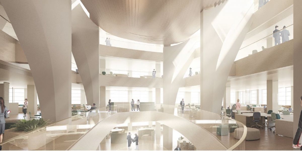 The atrium void that runs through the commercial levels within the heritage podium to the base of the suspended residential tower allows natural light to illuminate the office and retail spaces within the building.